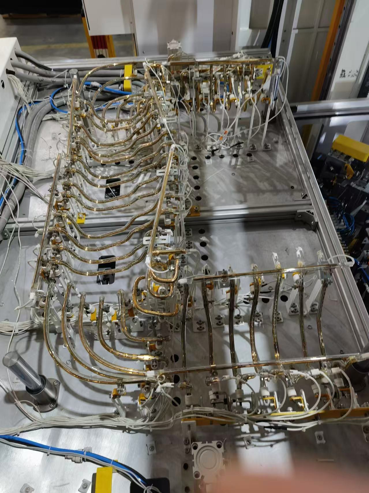 Complex custom-shaped infrared heating system integrated into industrial equipment