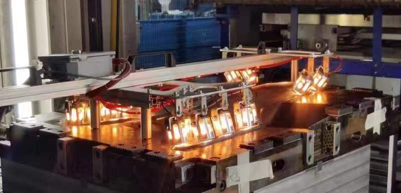 Custom infrared heating system operating inside industrial production equipment